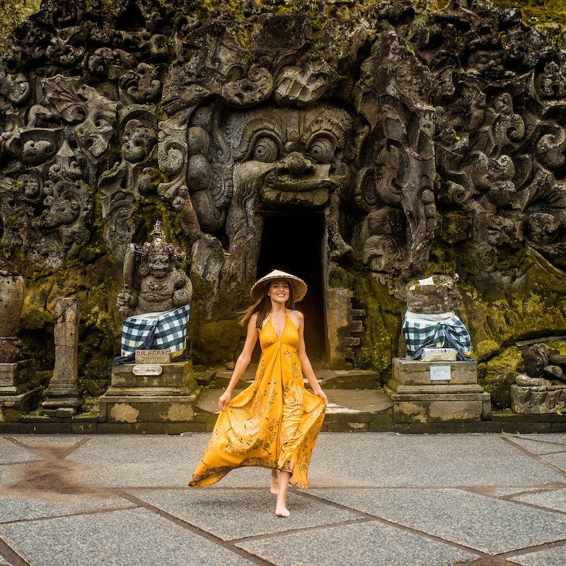 A young woman in the old Hindu temple of Goa Gajah near Ubud, Bali, Indonesia