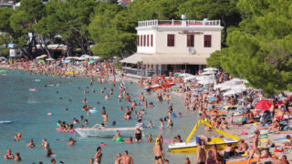 Crowded Beach In Makarska, Croatia, Overtourism ConceptCrowded Beach In Makarska, Croatia, Overtourism Concept
