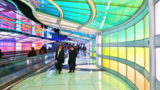 The colored electric neon tunnel The Sky Is the Limit at Chicago O'Hare International Airport