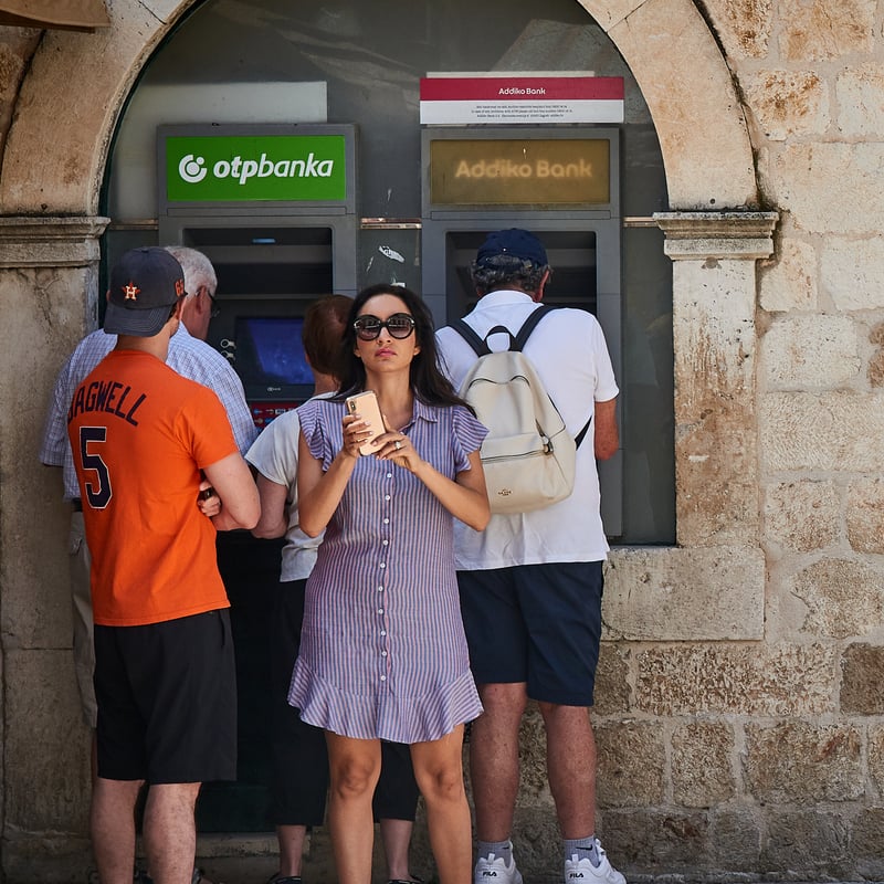 Tourists Withdrawing Money From An ATM, Bankomat In Dubrovnik, Croatia