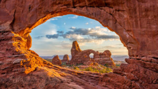 Turret arch through the North Window at Arches National Park_Feature