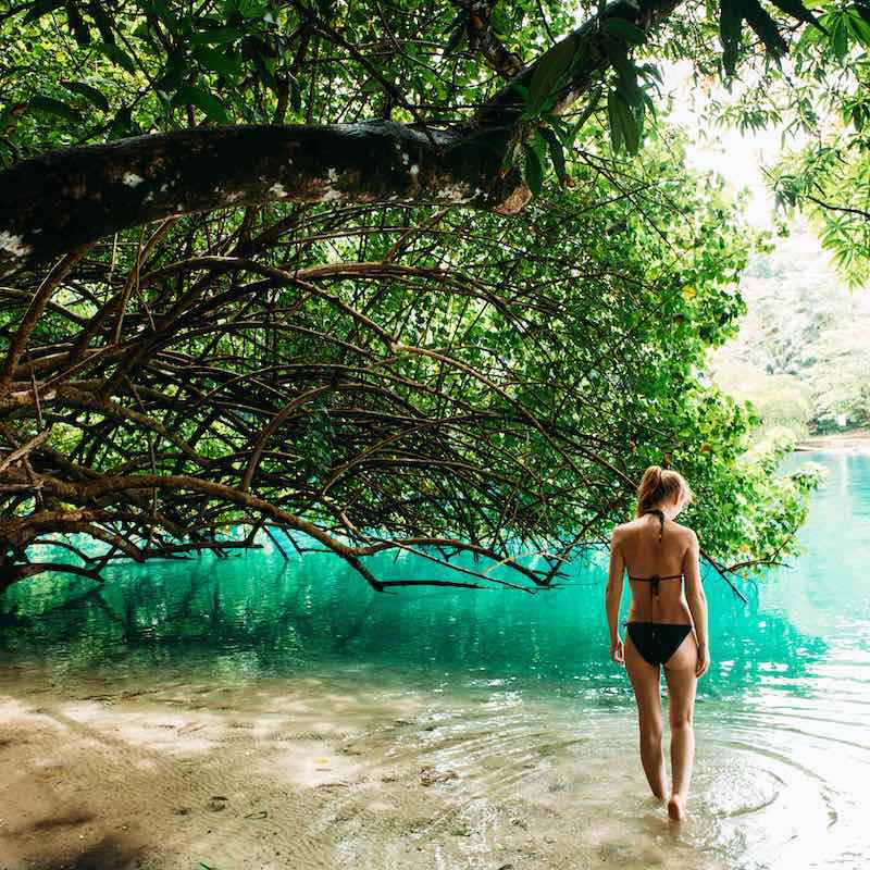 A Young Woman In Blue Lagoon In Jamaica