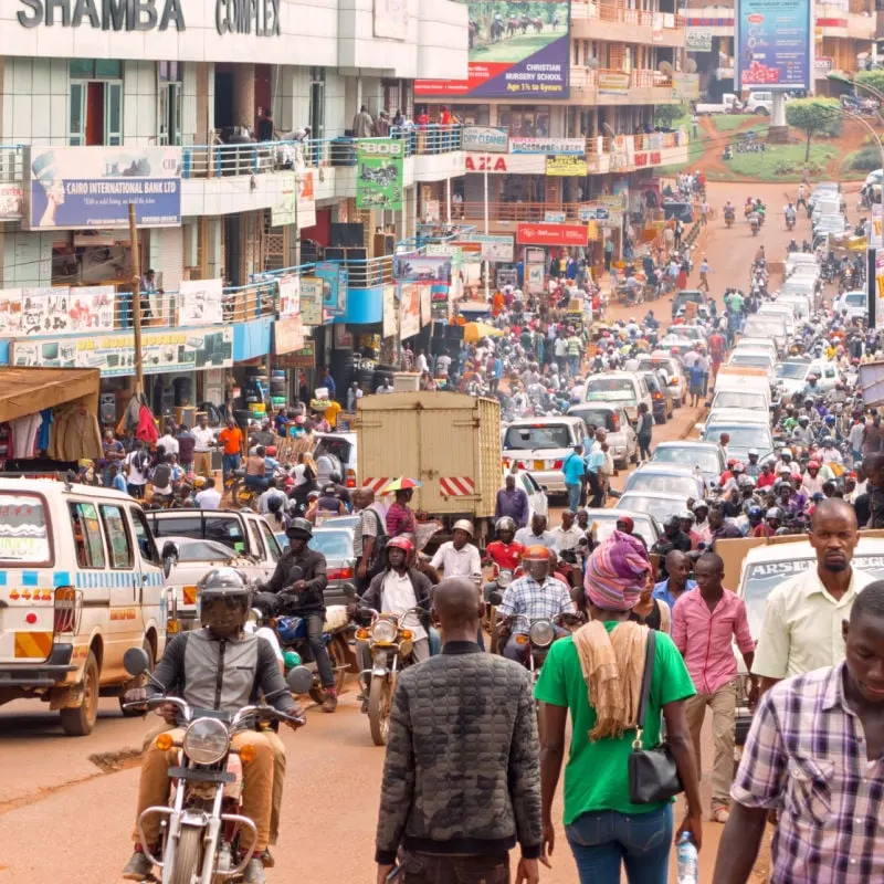 A busy street with lots of traffic in Kampala, Uganda