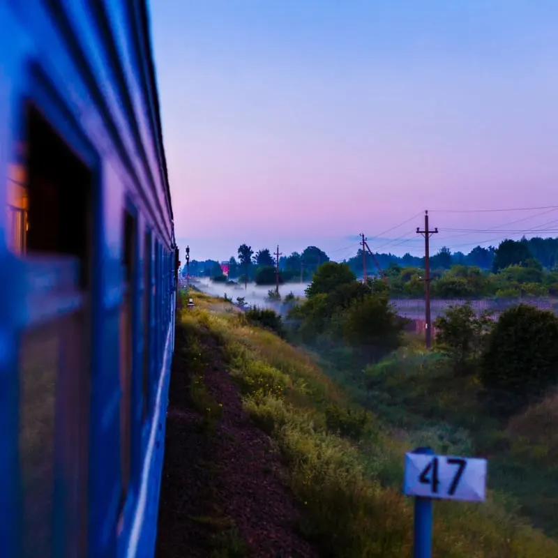A train passing through European landscape