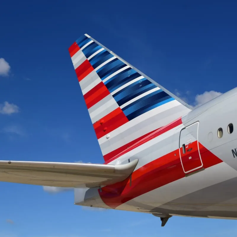 American airlines plane in blue sky, flights