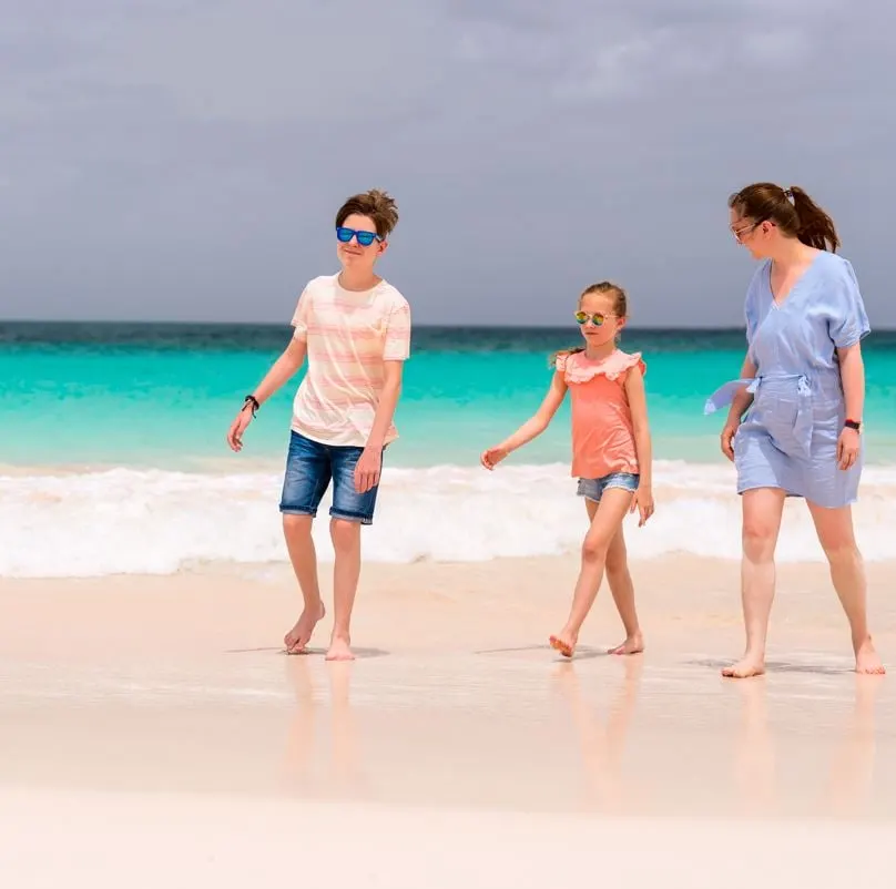 Barbados family walking on the beach
