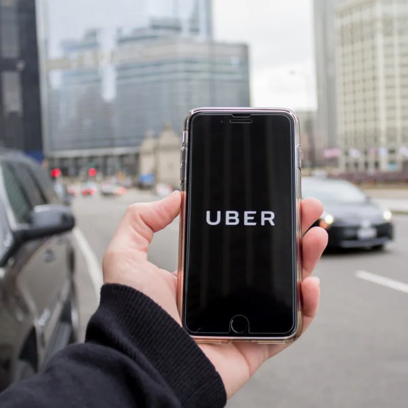 booking uber on smartphone
