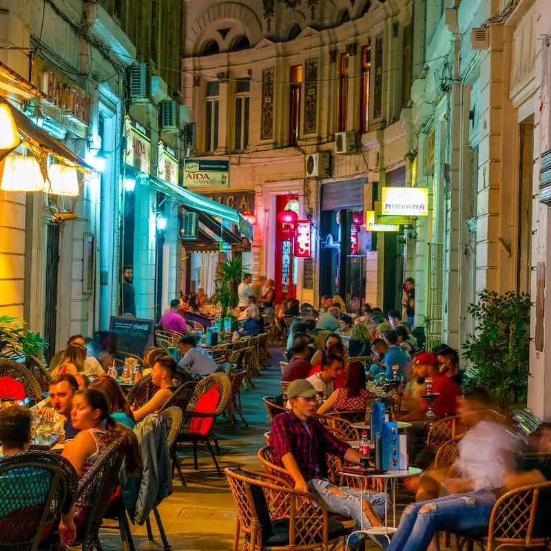 Cafes within the Pasajul Macca- Vilacrosse Arcade at night in Bucharest, Romania