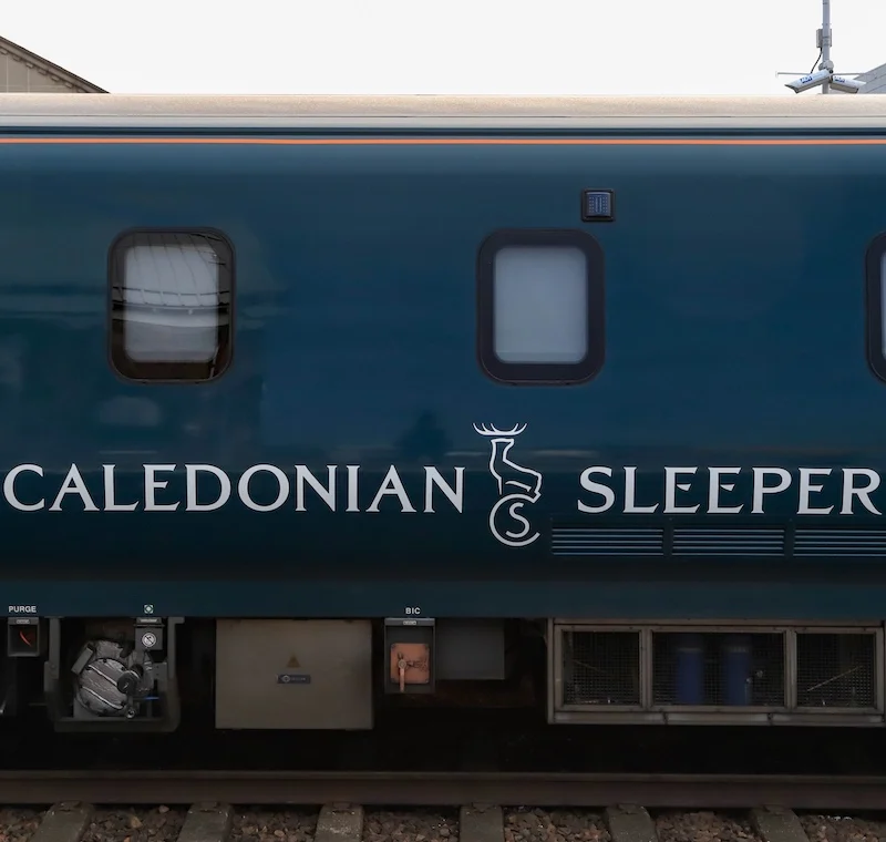 Caledonian Sleeper logo on carriage in Inverness, Scotland