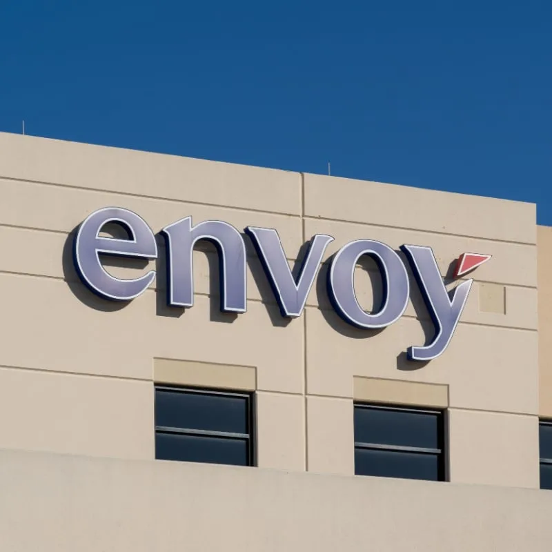 Closeup of Envoy sign on the building at its headquarters in Irving, Texas, USA. Envoy Air Inc