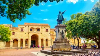Columbus statue and Basilica Cathedral of Santa Maria la Menor in Santo Domingo Colonial zone