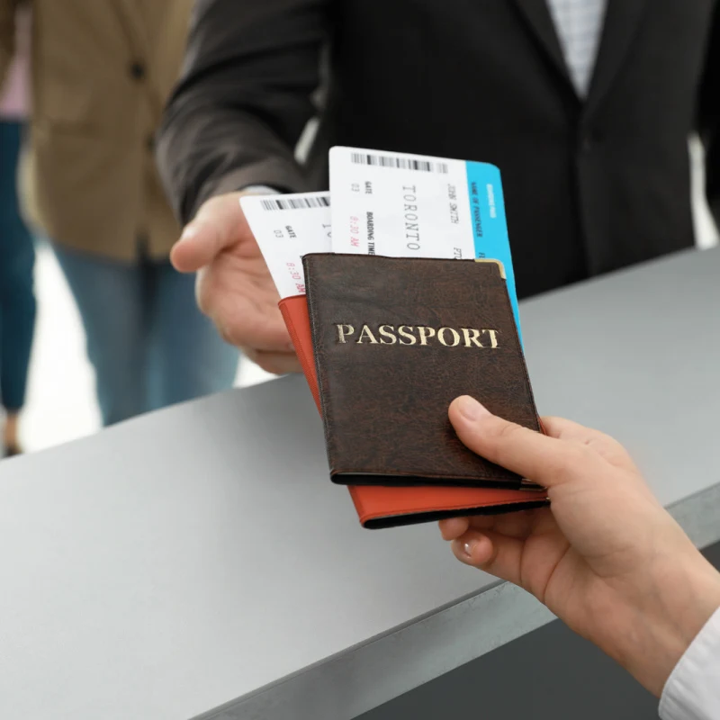 handing passport over to gate agent