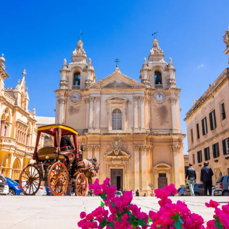 Historic Roman Catholic Cathedral of Saint Paul in main town square of Mdina village in Malta, Europe