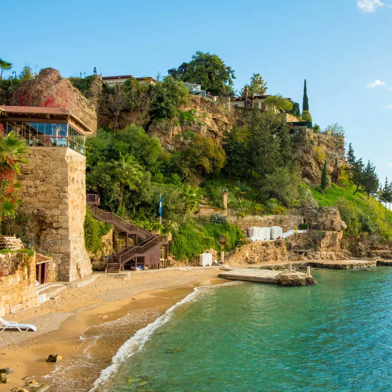 Mermeli Beach In Antalya, A Small Beach Beneath The Cliffs Of Kaleici Old Town, Turkiye, East Mediterranean Coast