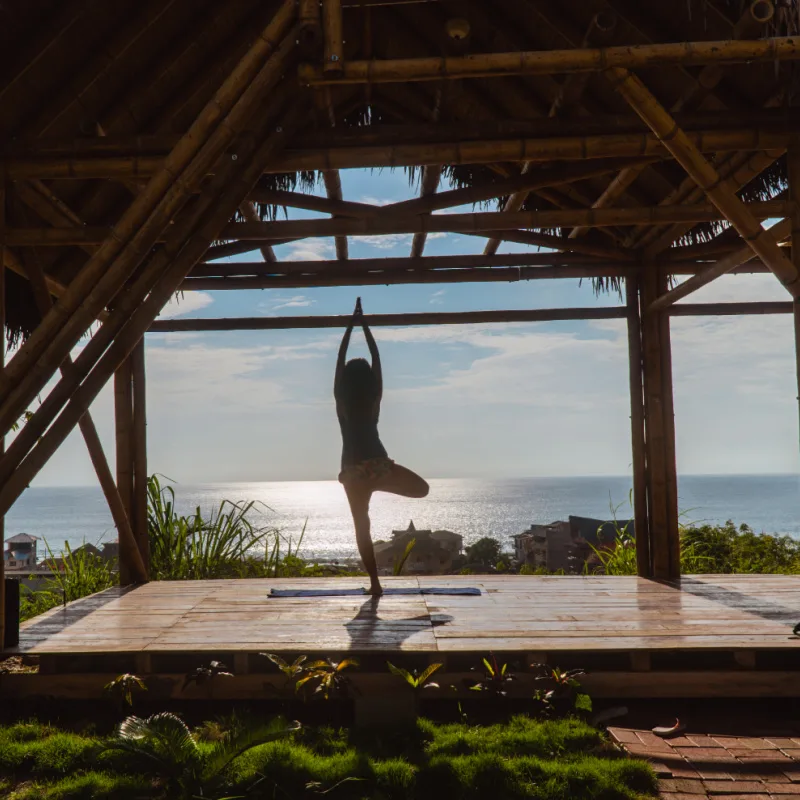 Woman doing yoga in Montanita Ecuador