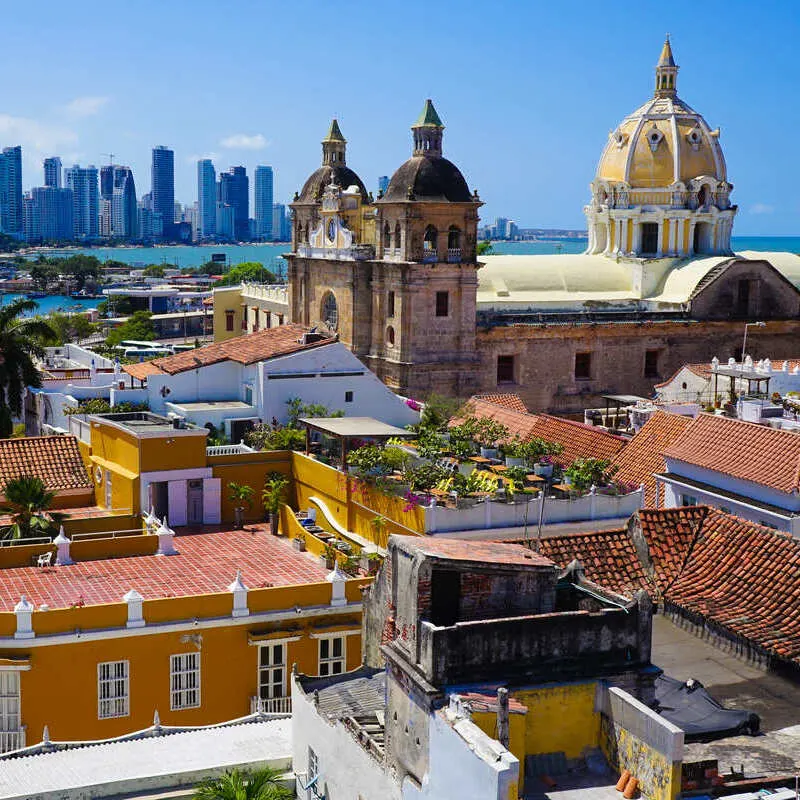 Panorama Of The Old City Of Cartagena With Skyscrapers And A Modern Development Zone Seen Across The Caribbean Sea, Colombia, South America