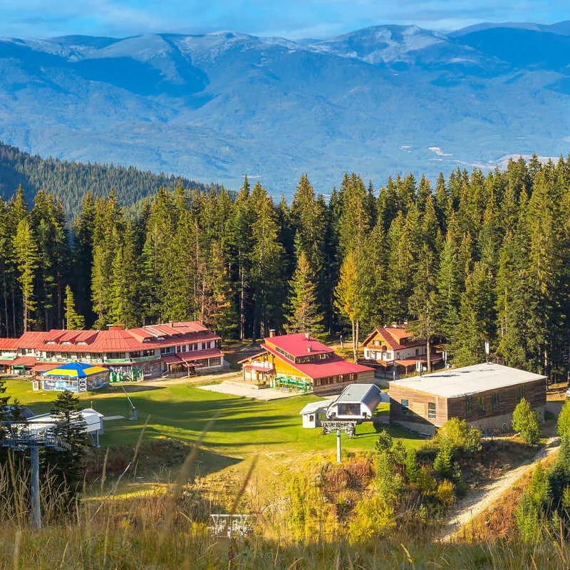 Panoramic View Of Bansko, A Traditional Alpine Town In The Pirin Mountains Of Bulgaria, Eastern Europe