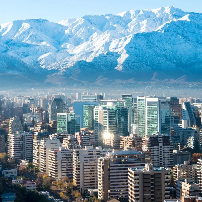 skyline of santiago chile with snowcapped mountains