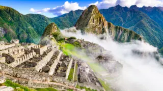 Ancient site of Machu Piccu in the clouds in Peru