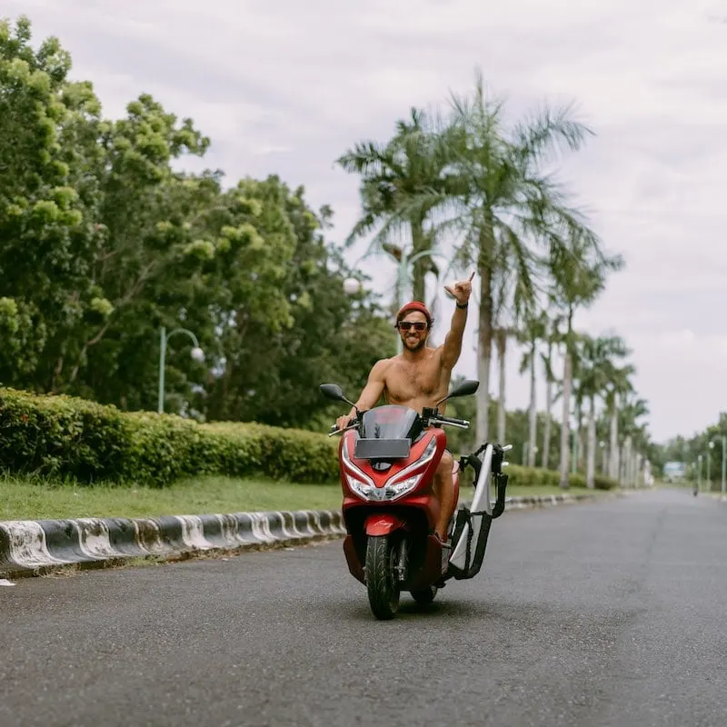 tourist driving scooter in Bali.jpeg