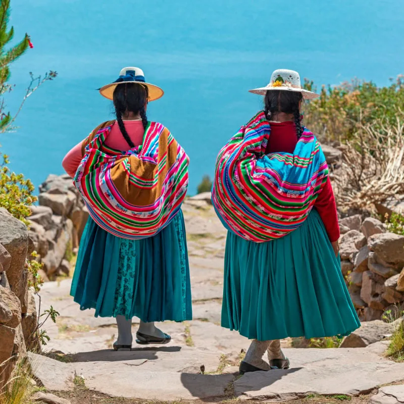 two-indigenous-quechua-women-traditional-clothes-peru