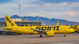 Two Spirit airways planes on the runway at the airport