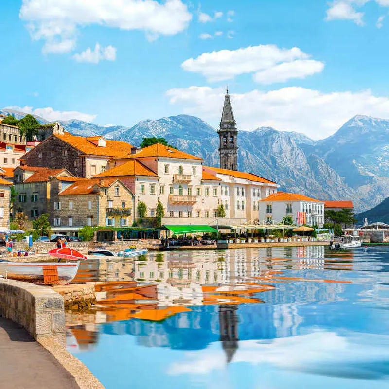 View Of Perast Town, A Small Medieval Village On Kotor Bay, From Across The Promenade, Montenegro, South Eastern Europe, Balkan Peninsula