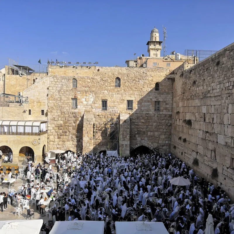 crowds gather to pray at the Wailing Wall in Jerusalem
