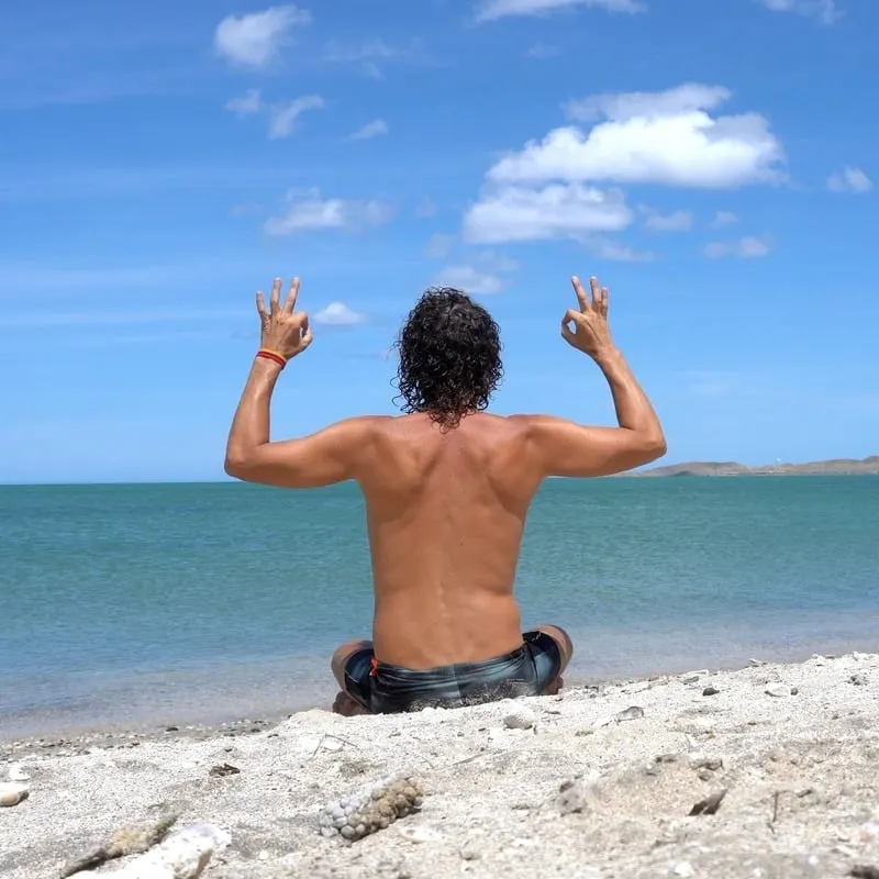 Young Man Practising Yoga At A Beach In Los Cabos, Baja California Sur, Mexico